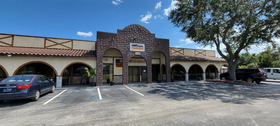 Portal Immersion Center entrance with Willkommen arch, 2198 Four Winds Blvd, Kissimmee